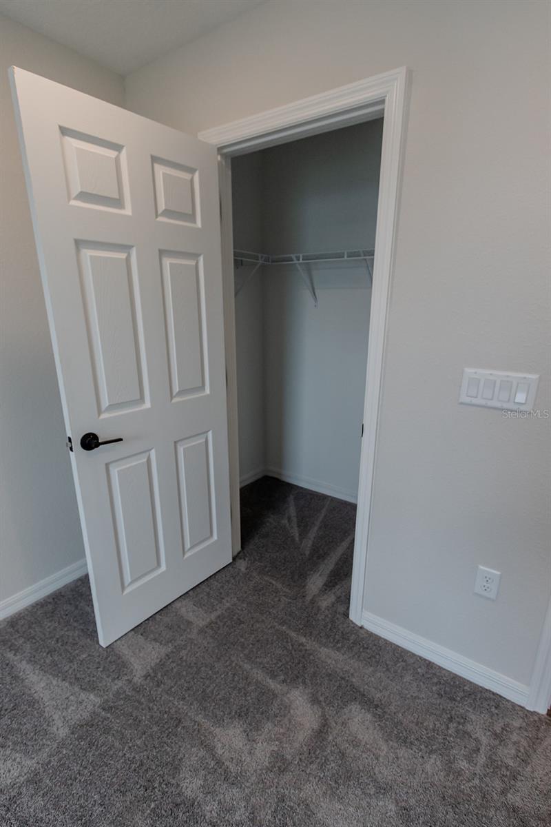 Interior photos are of a different property, same model.  This home has similar finishings.