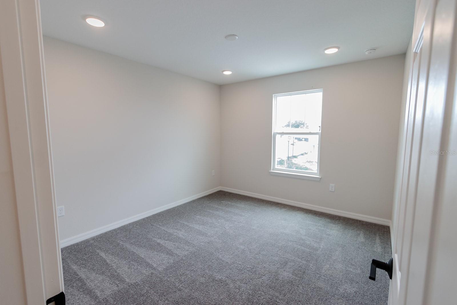 Interior photos are of a different property, same model.  This home has similar finishings.