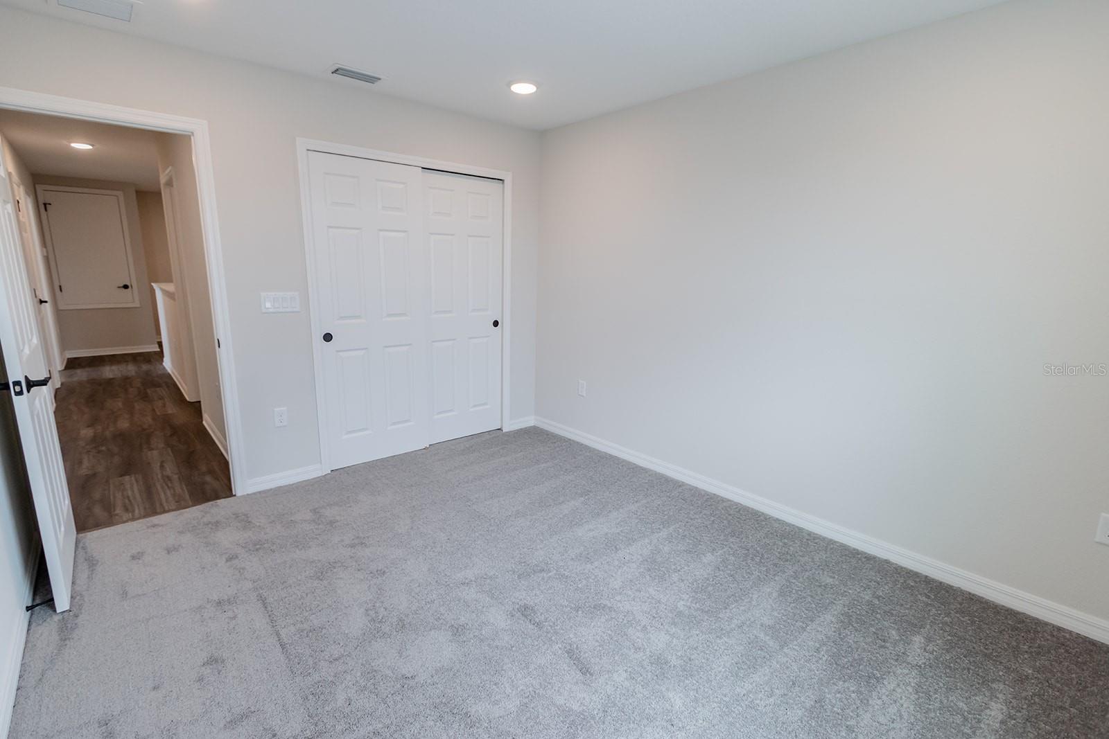 Interior photos are of a different property, same model.  This home has similar finishings.