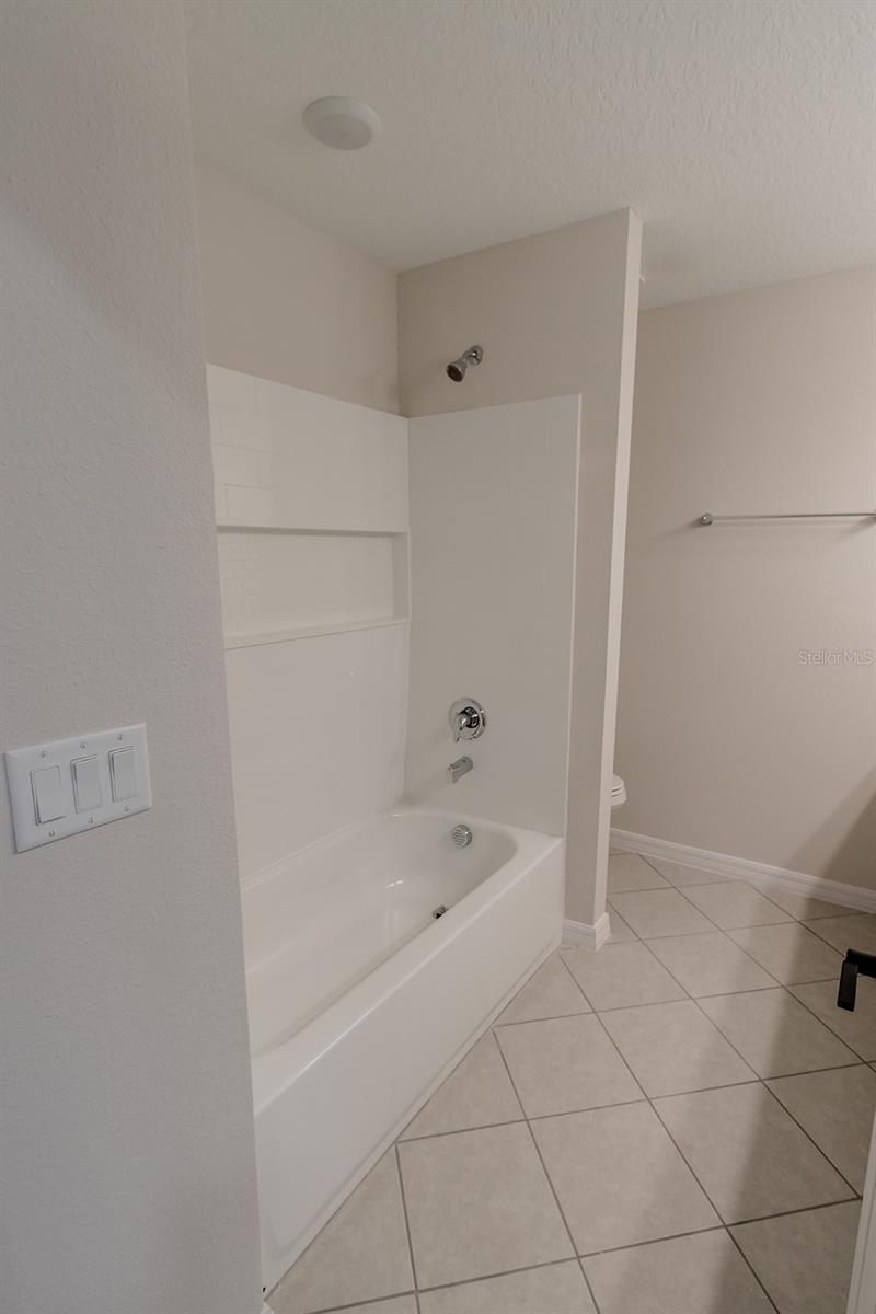 Interior photos are of a different property, same model.  This home has similar finishings.