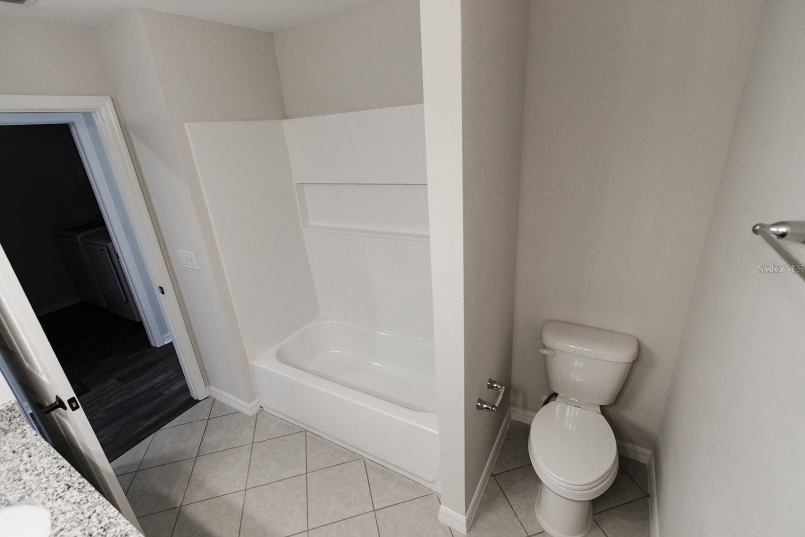 Interior photos are of a different property, same model.  This home has similar finishings.