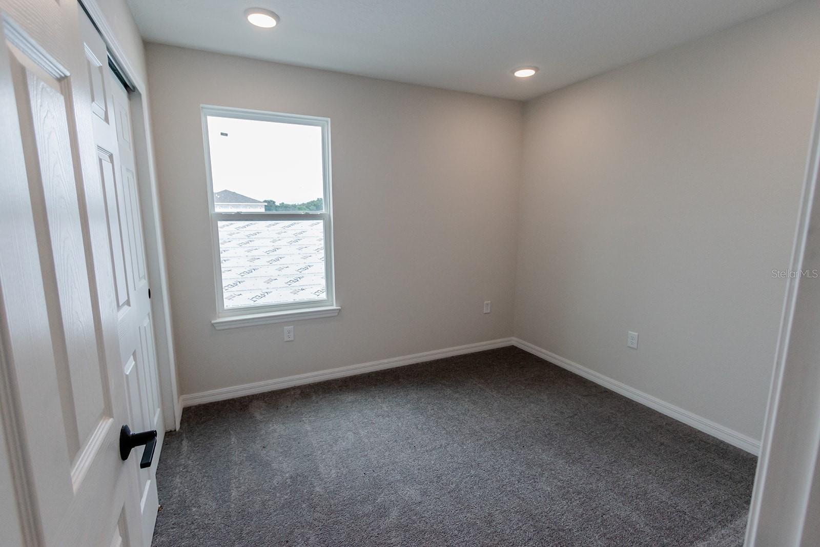 Interior photos are of a different property, same model.  This home has similar finishings.