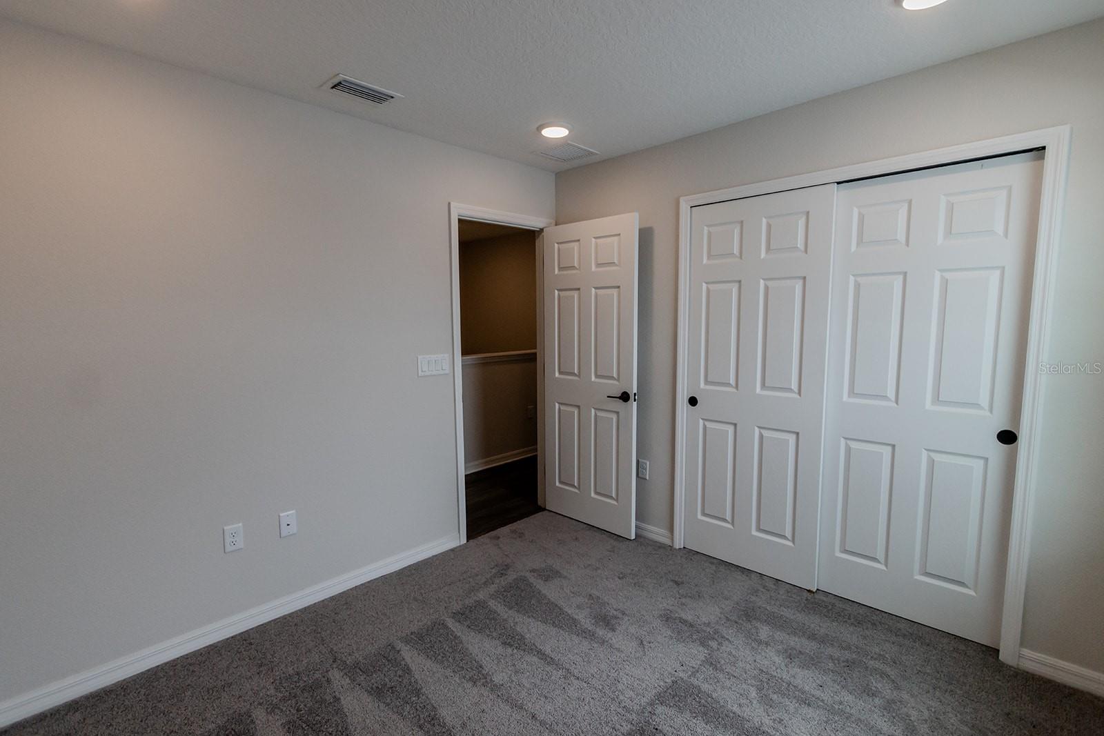 Interior photos are of a different property, same model.  This home has similar finishings.