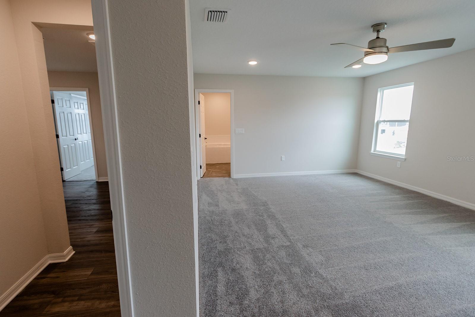 Interior photos are of a different property, same model.  This home has similar finishings.
