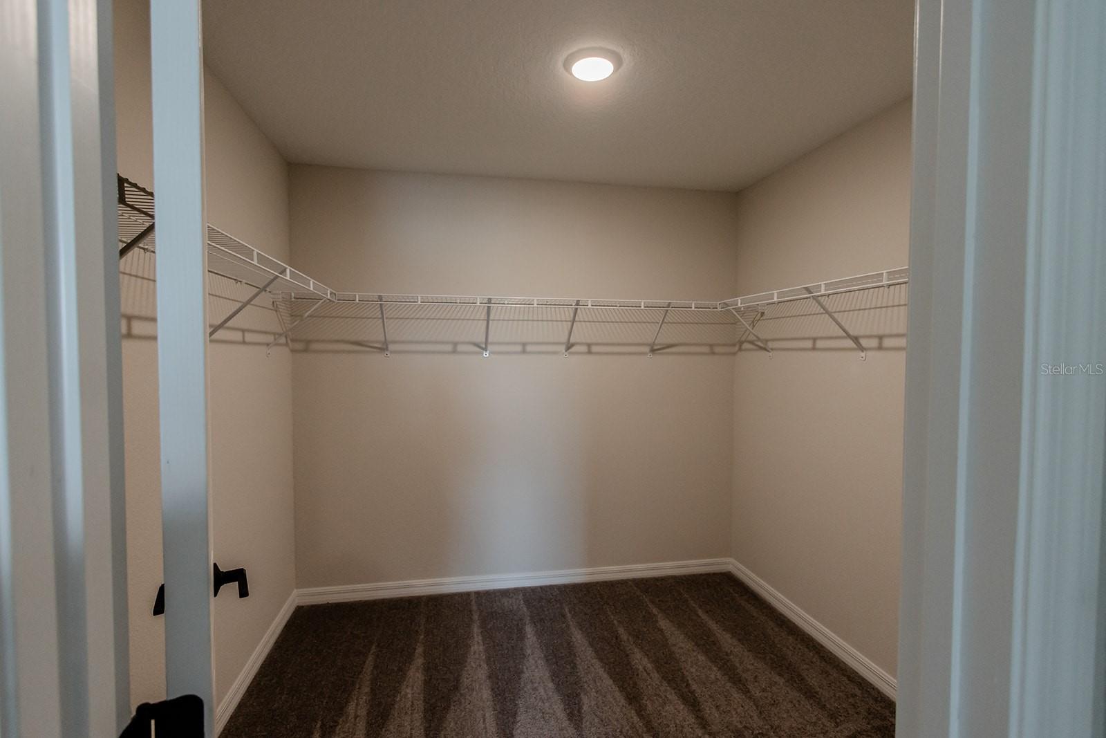 Interior photos are of a different property, same model.  This home has similar finishings.