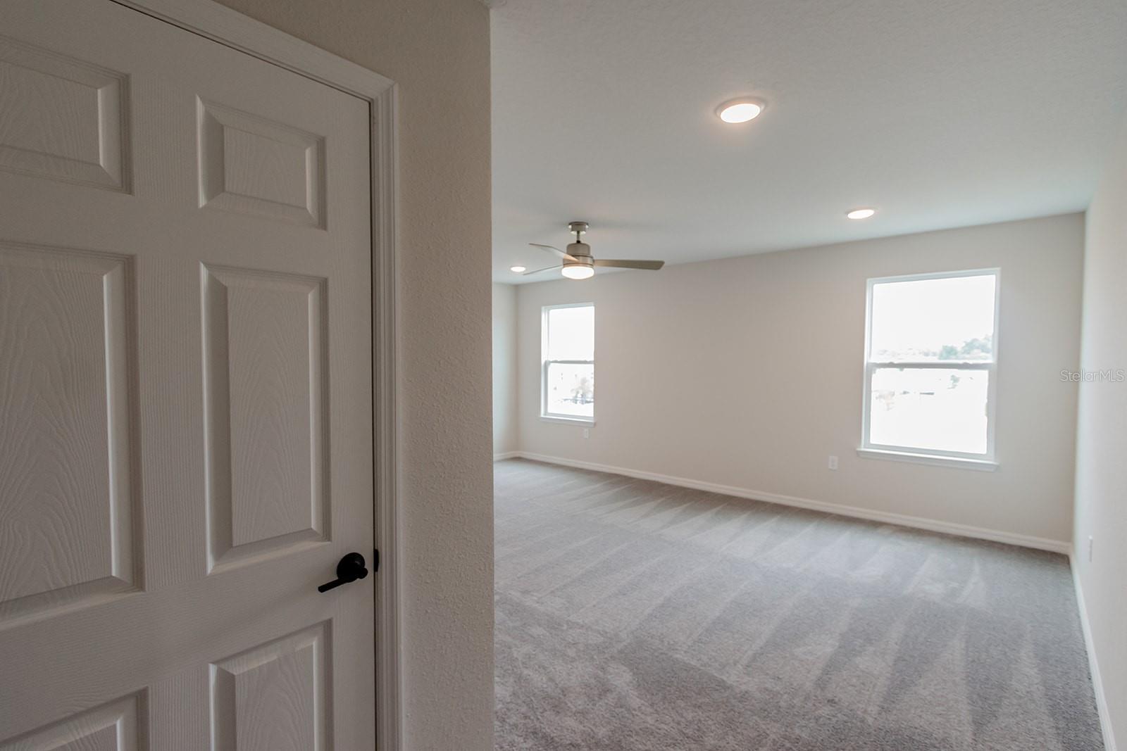 Interior photos are of a different property, same model.  This home has similar finishings.