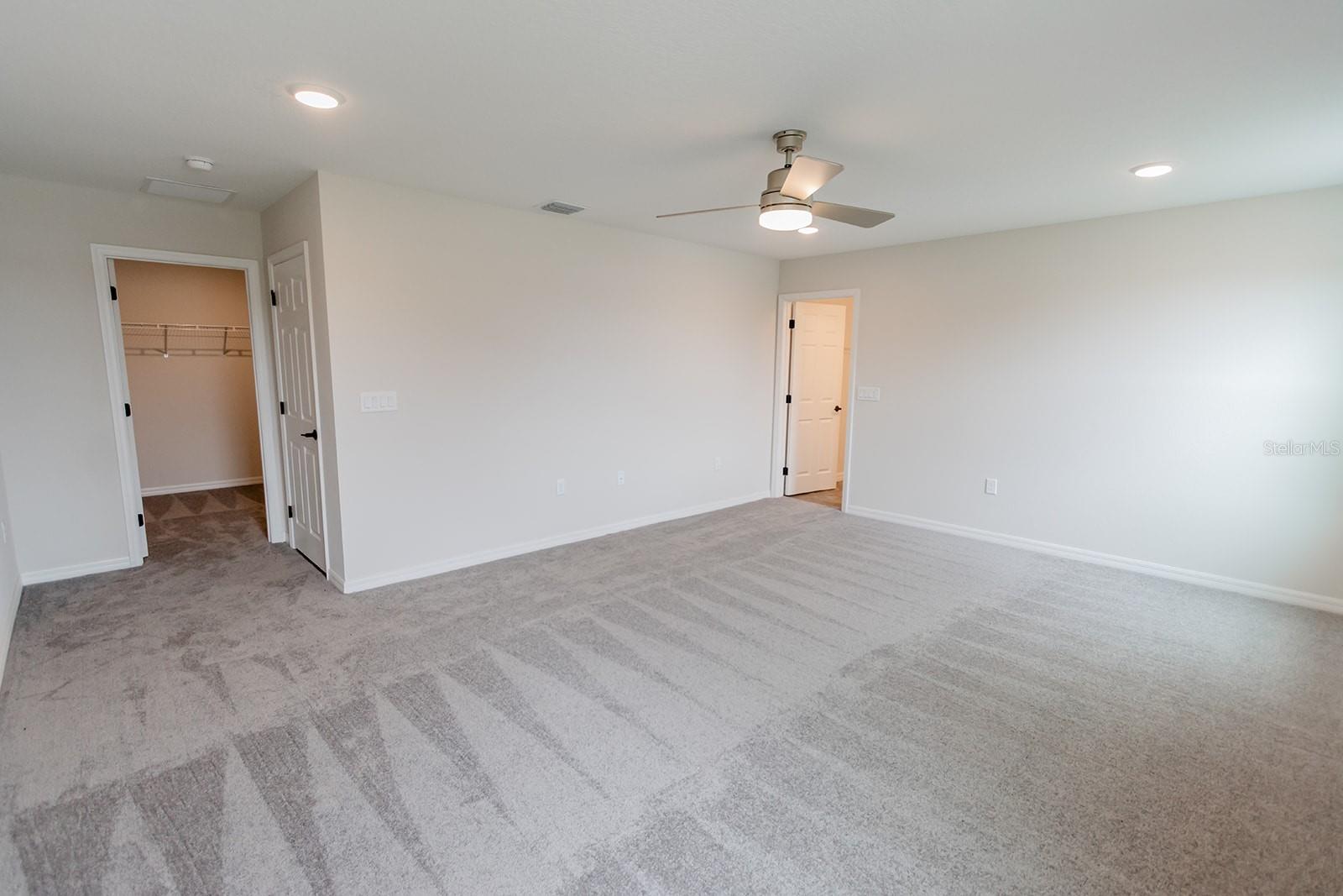Interior photos are of a different property, same model.  This home has similar finishings.