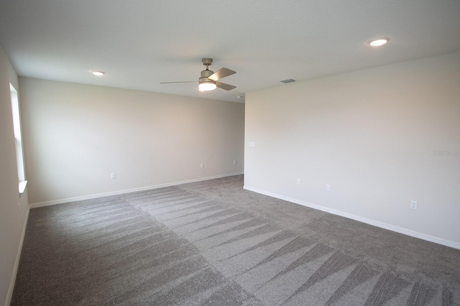Interior photos are of a different property, same model.  This home has similar finishings.