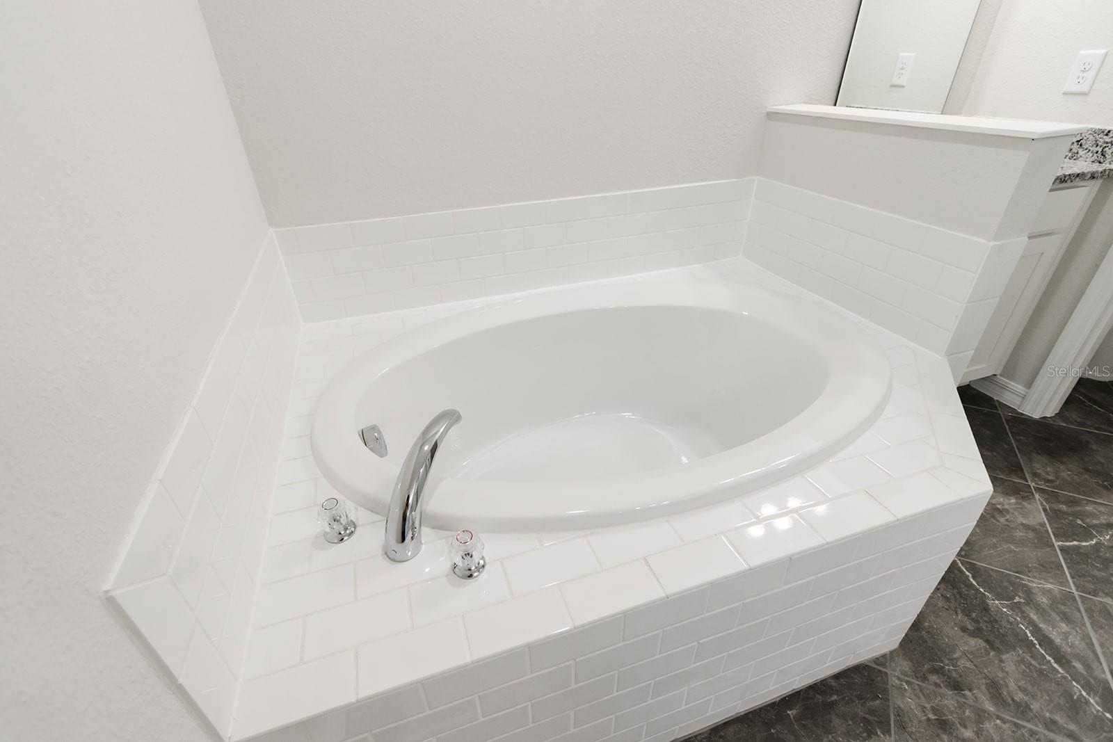 Interior photos are of a different property, same model.  This home has similar finishings.