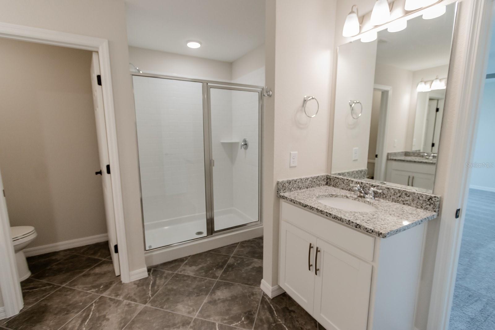 Interior photos are of a different property, same model.  This home has similar finishings.