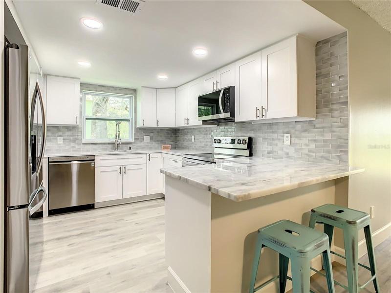 The “chef’s dream kitchen” epitomizes modern sophistication and functionality