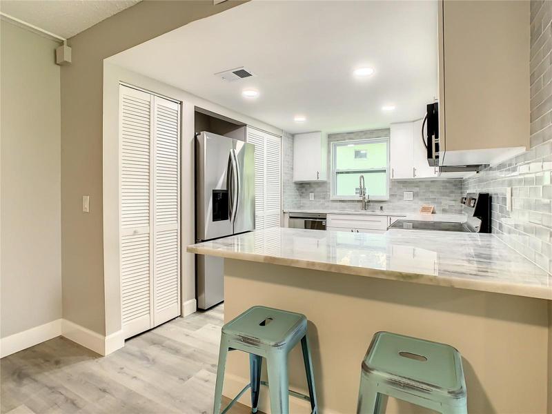 The “chef’s dream kitchen” epitomizes modern sophistication and functionality