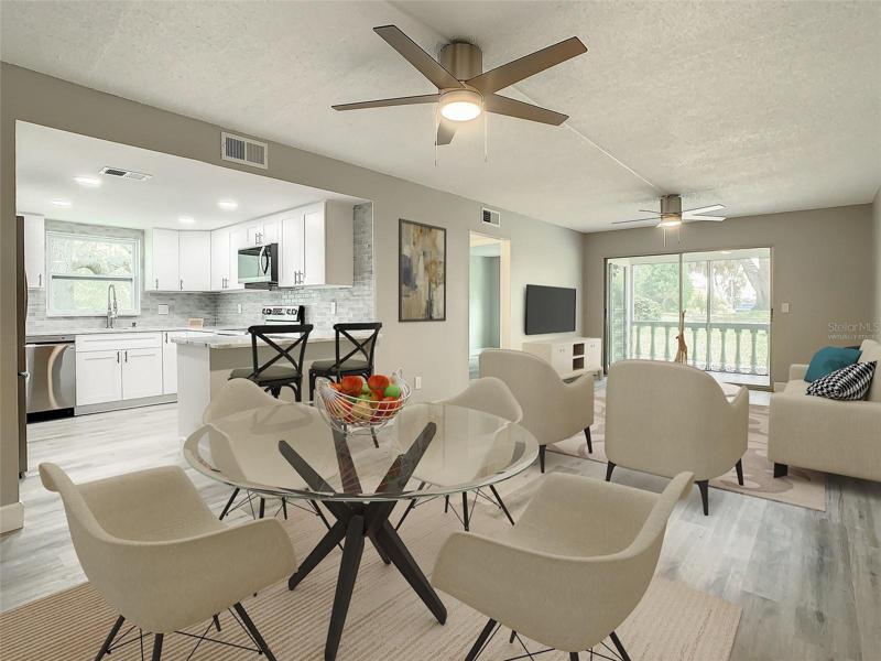 Virtually Staged- Main Living space luxury vinyl wood-look flooring that flows throughout the home
