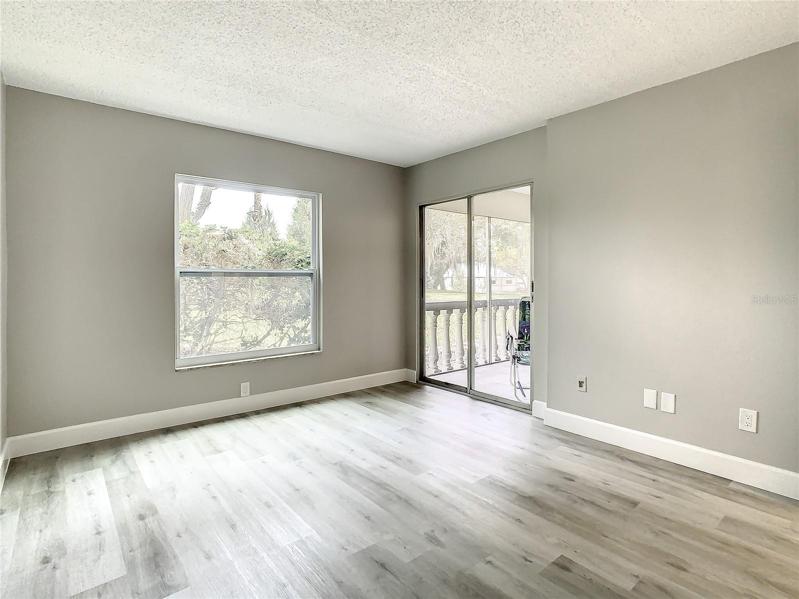 The bedroom also offers private access to this outdoor retreat through sliding glass doors and also enjoys a delightful second view from the large bedroom window