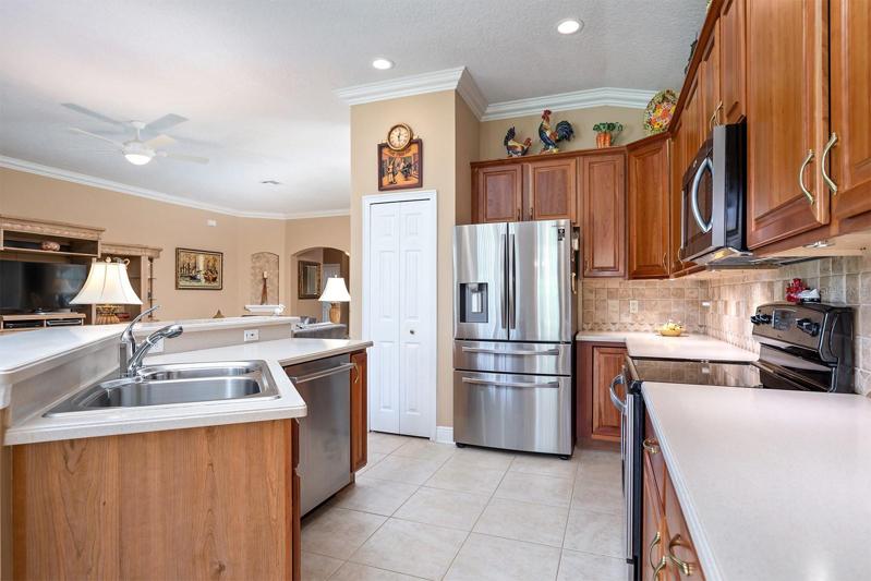 Open Kitchen with Recessed Lighting and Crown Molding