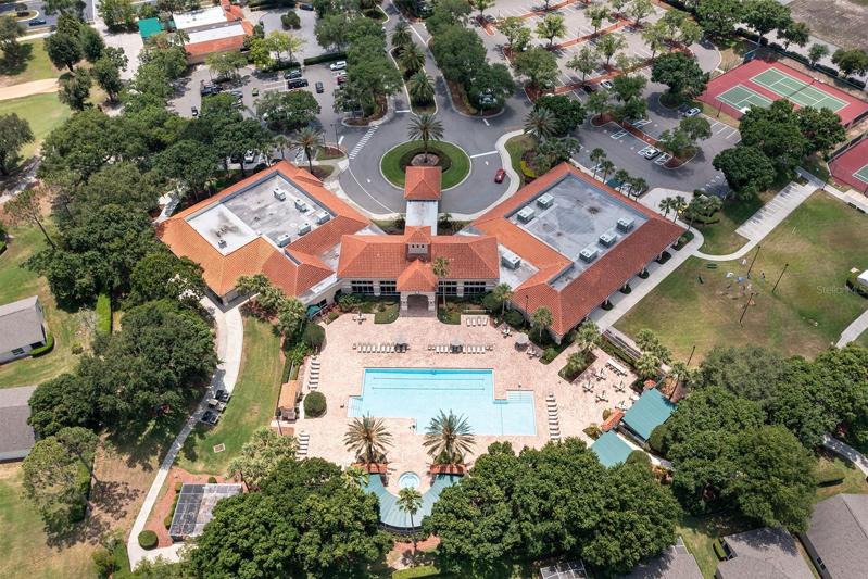Aerial view of the clubhouse pool and Tennis courts