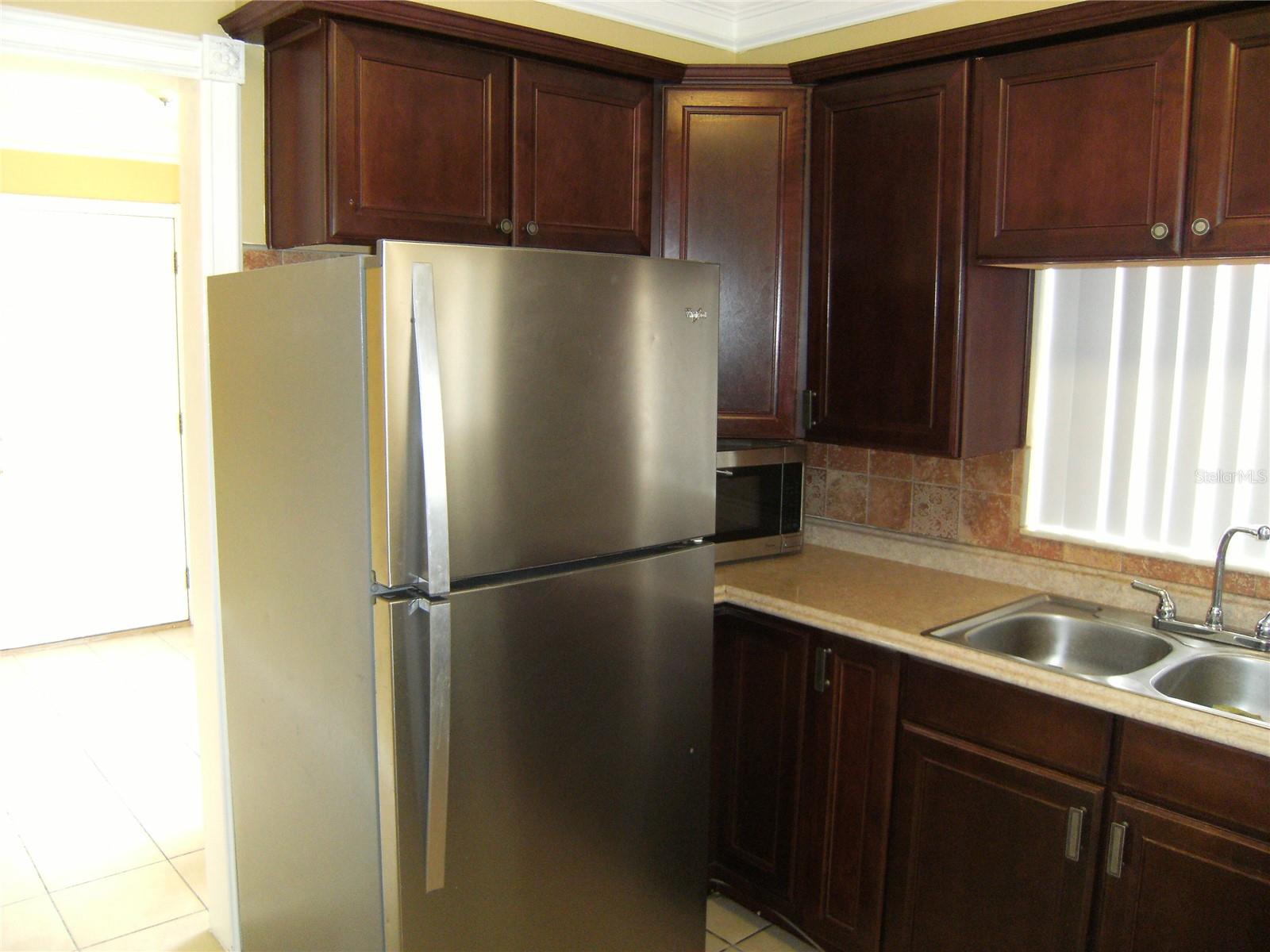 Kitchen refrigerator and stainless steel sink