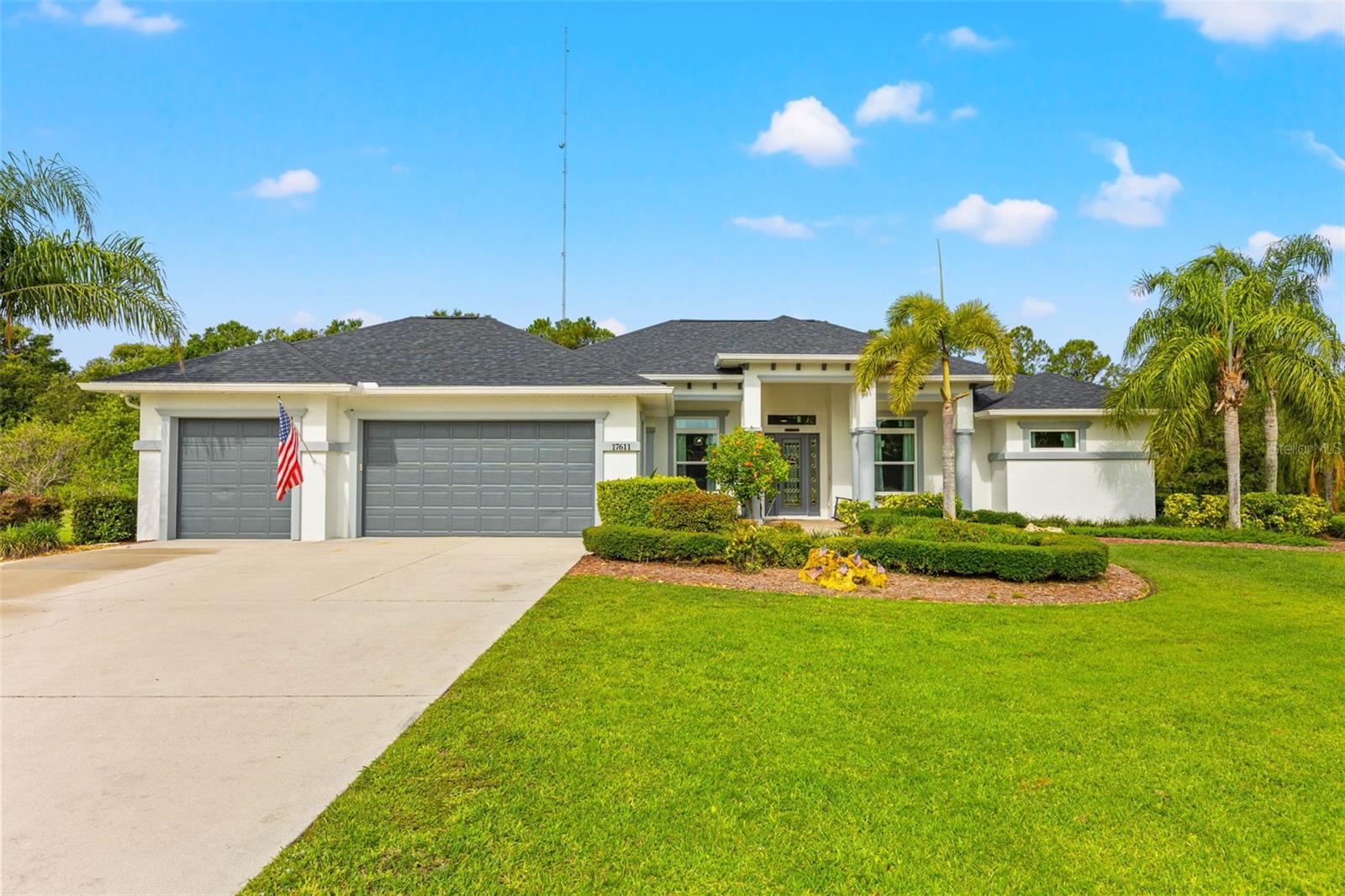 Gorgeous front entry with long driveway