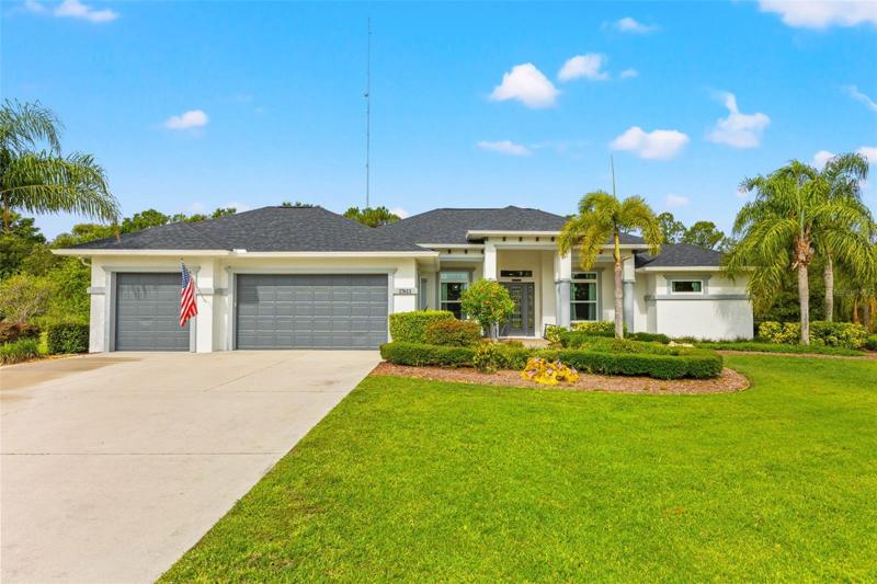 Gorgeous front entry with long driveway