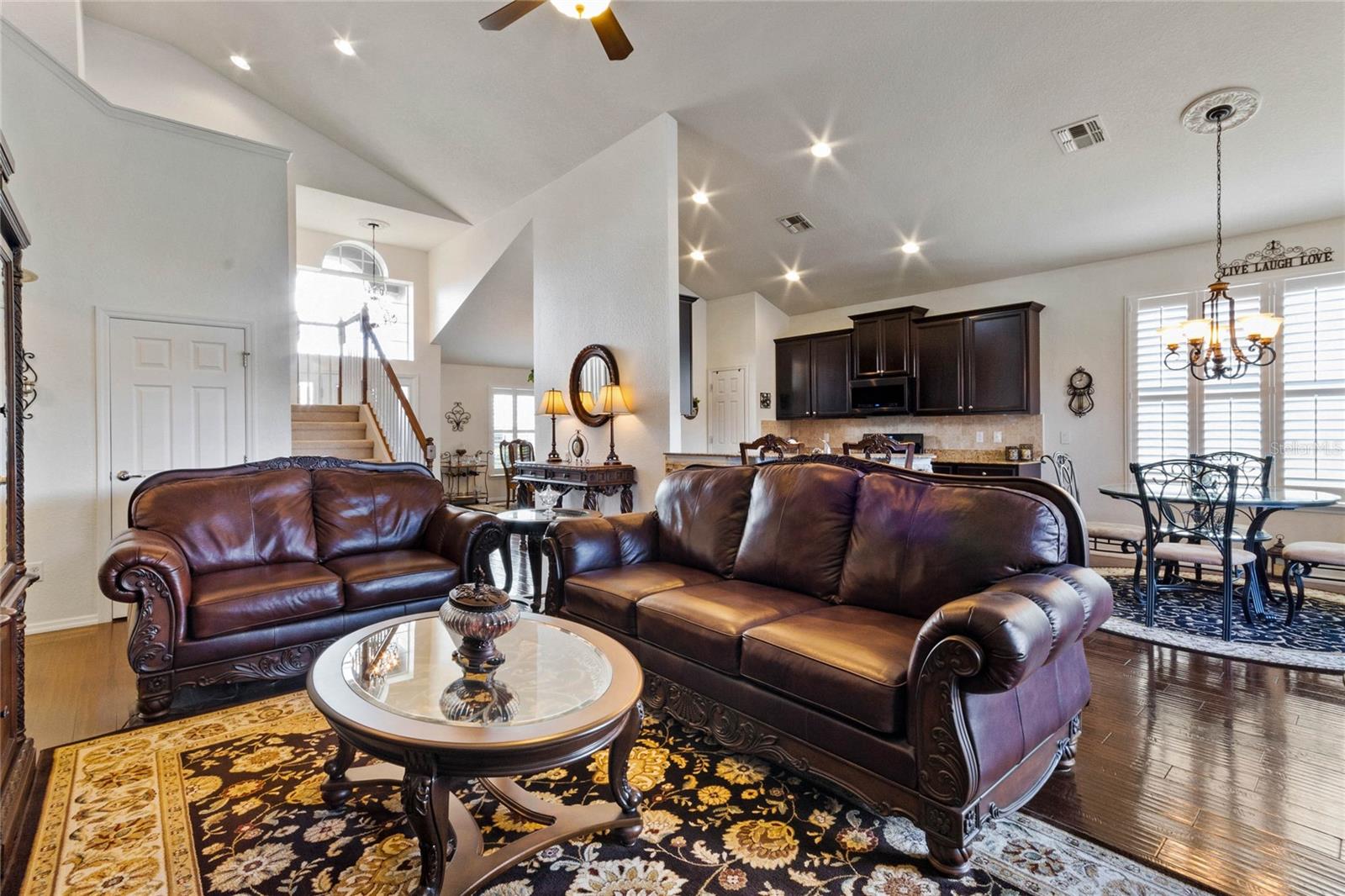 living room with vaulted ceilings