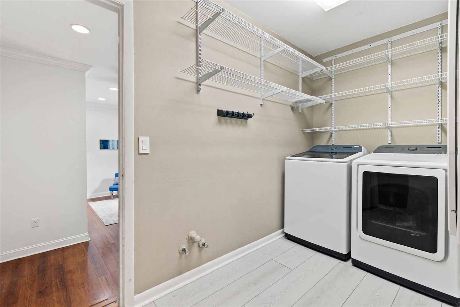 laundry room with storage