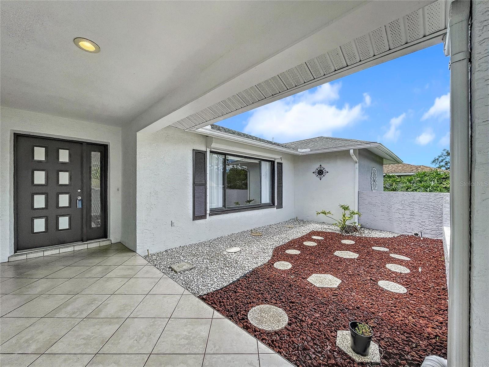 Front entry and open porch