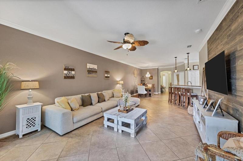 Family room with wood feature wall and fresh paint