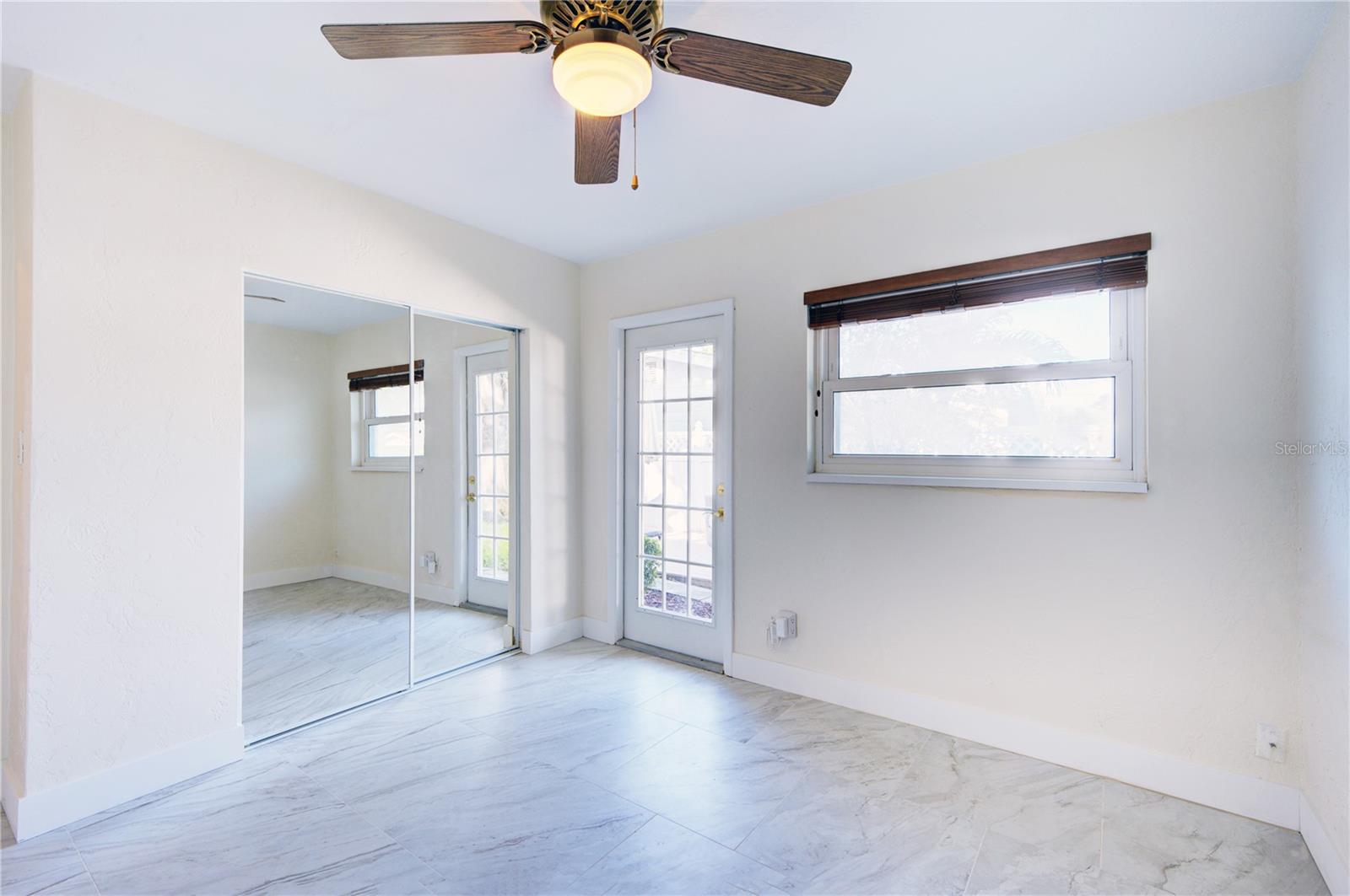 3rd bedroom or office with mirror closet