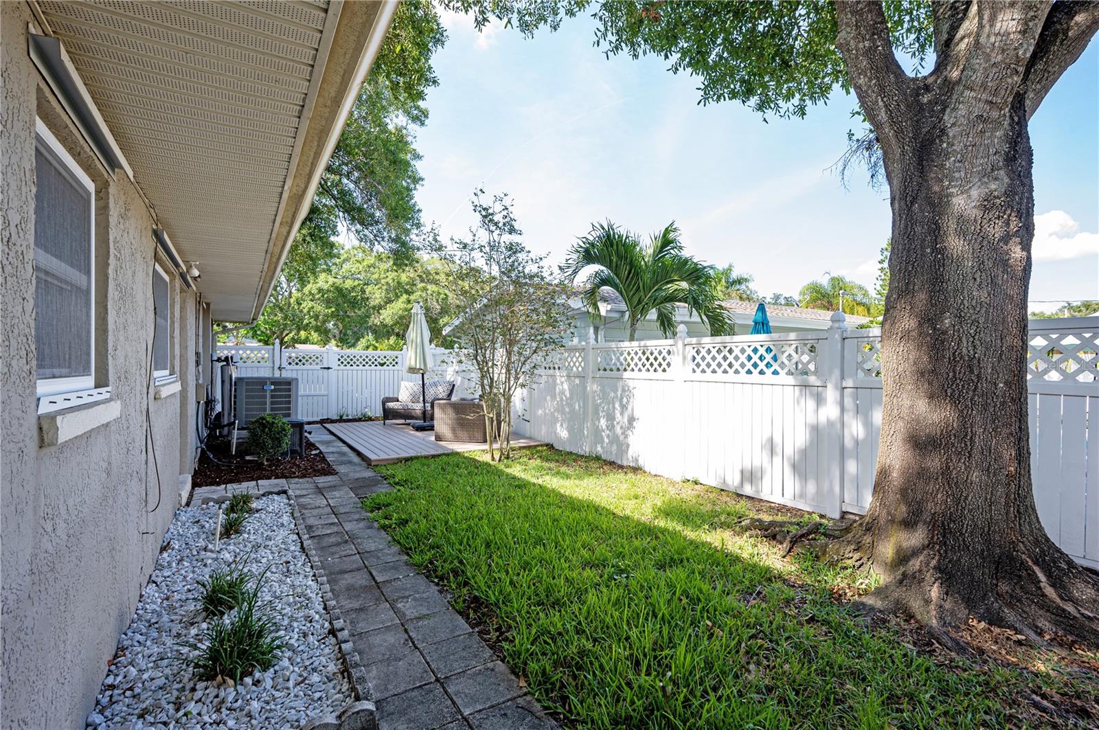 Backyard with private vinyl fencing