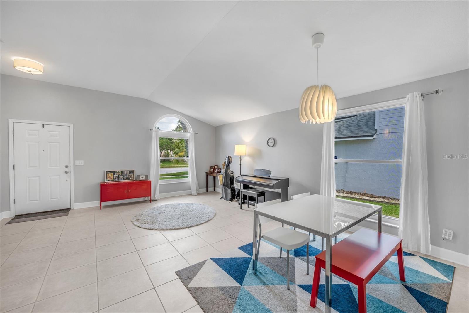 Bright &amp; spacious front living space, use this as a living/dining room, play room, office space or any thing to fit your needs!