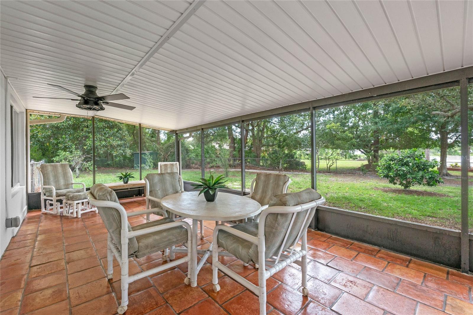 Tiled screened patio!