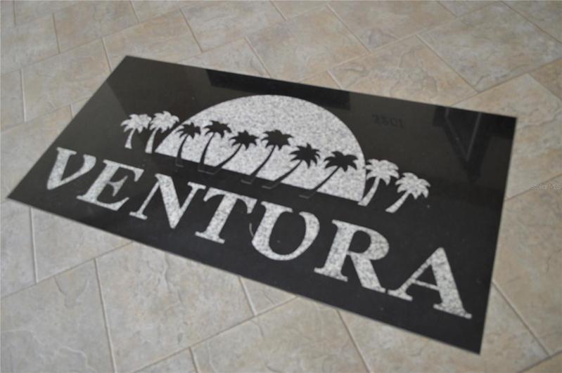 Ventura logo on the floor of the clubhouse entrance.