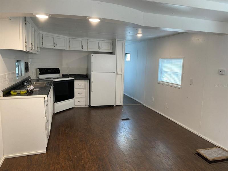 Front door to living and kitchen space