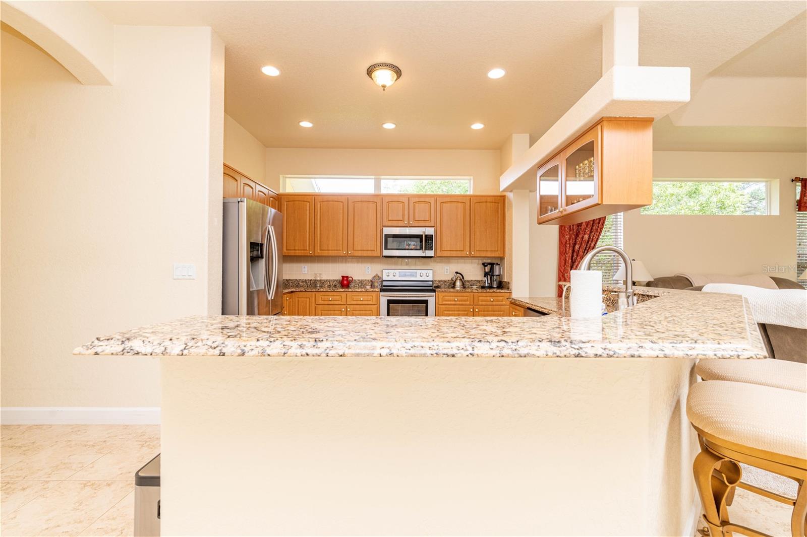Kitchen showing breakfast counter