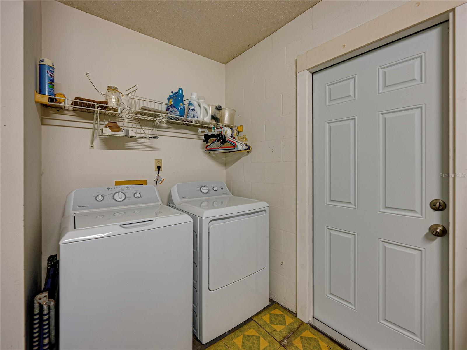 Laundry room in garage