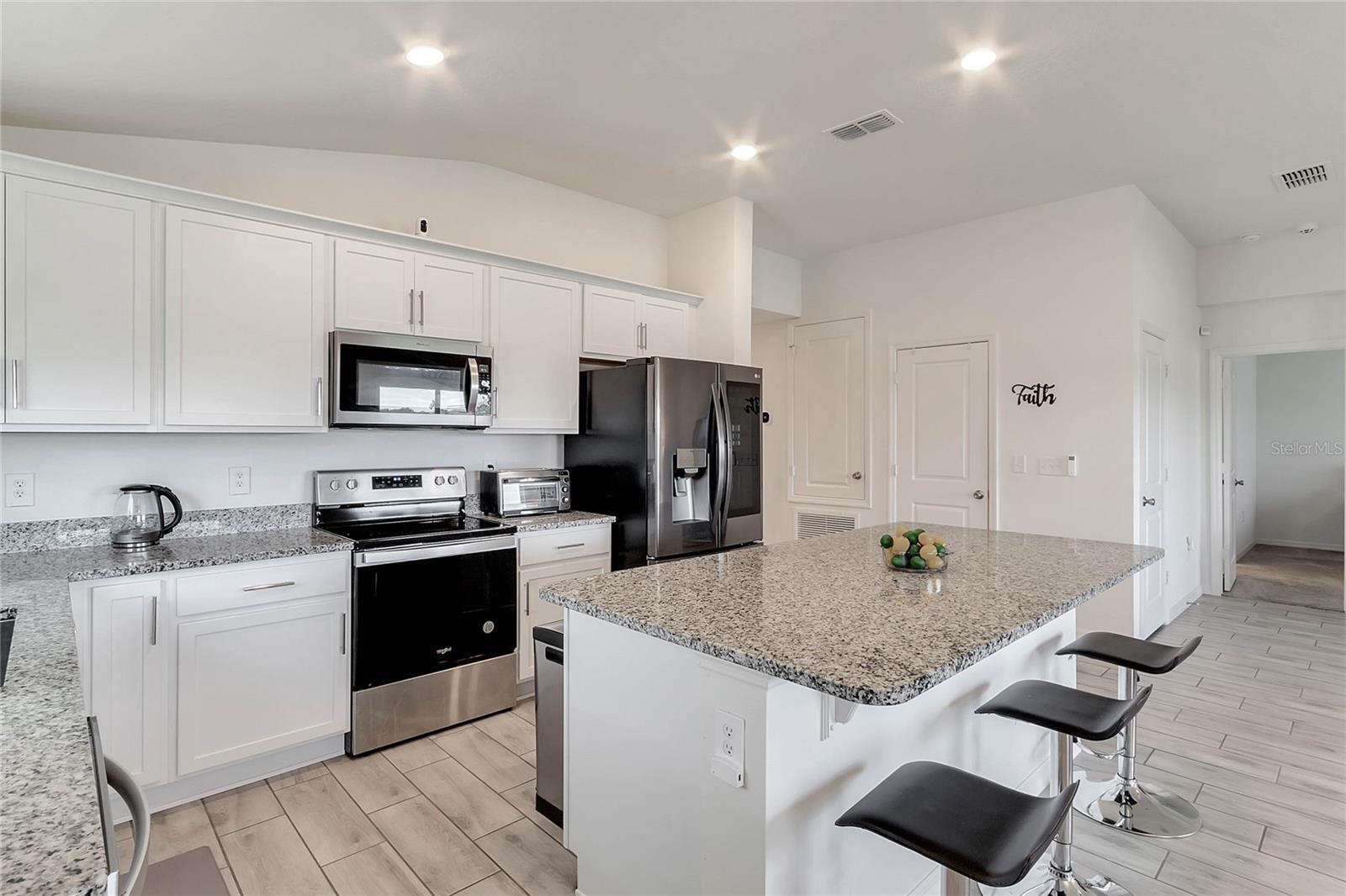 This layout creates a seamless flow, perfect for entertaining family and friends.