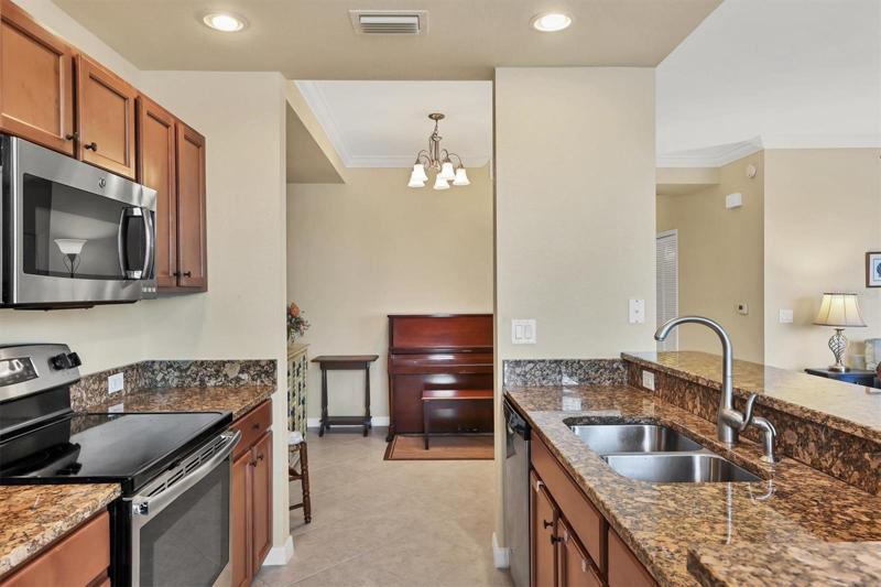 Kitchen to Dining or Den