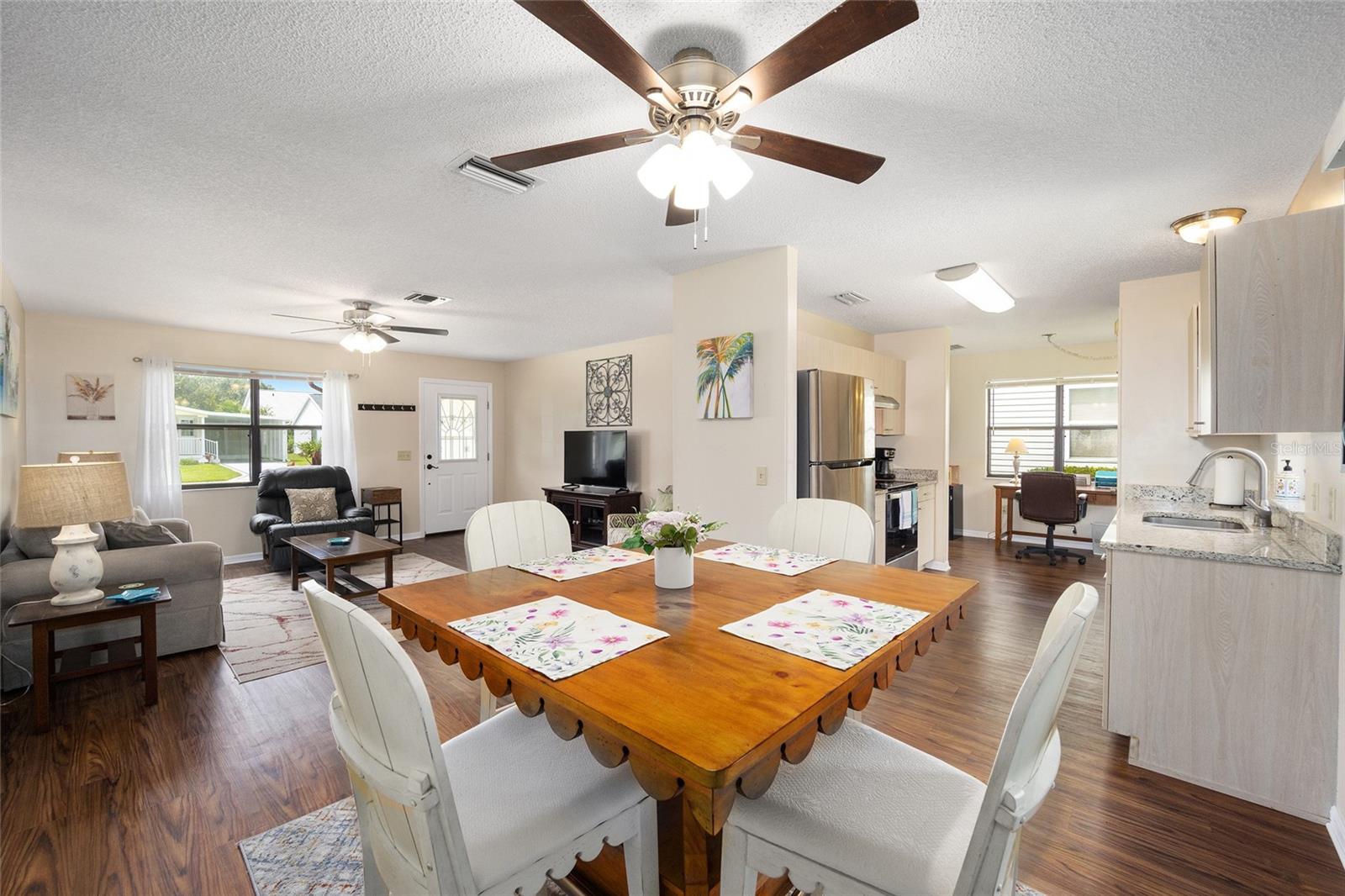 Dining area offers view of Living Room and Kitchen