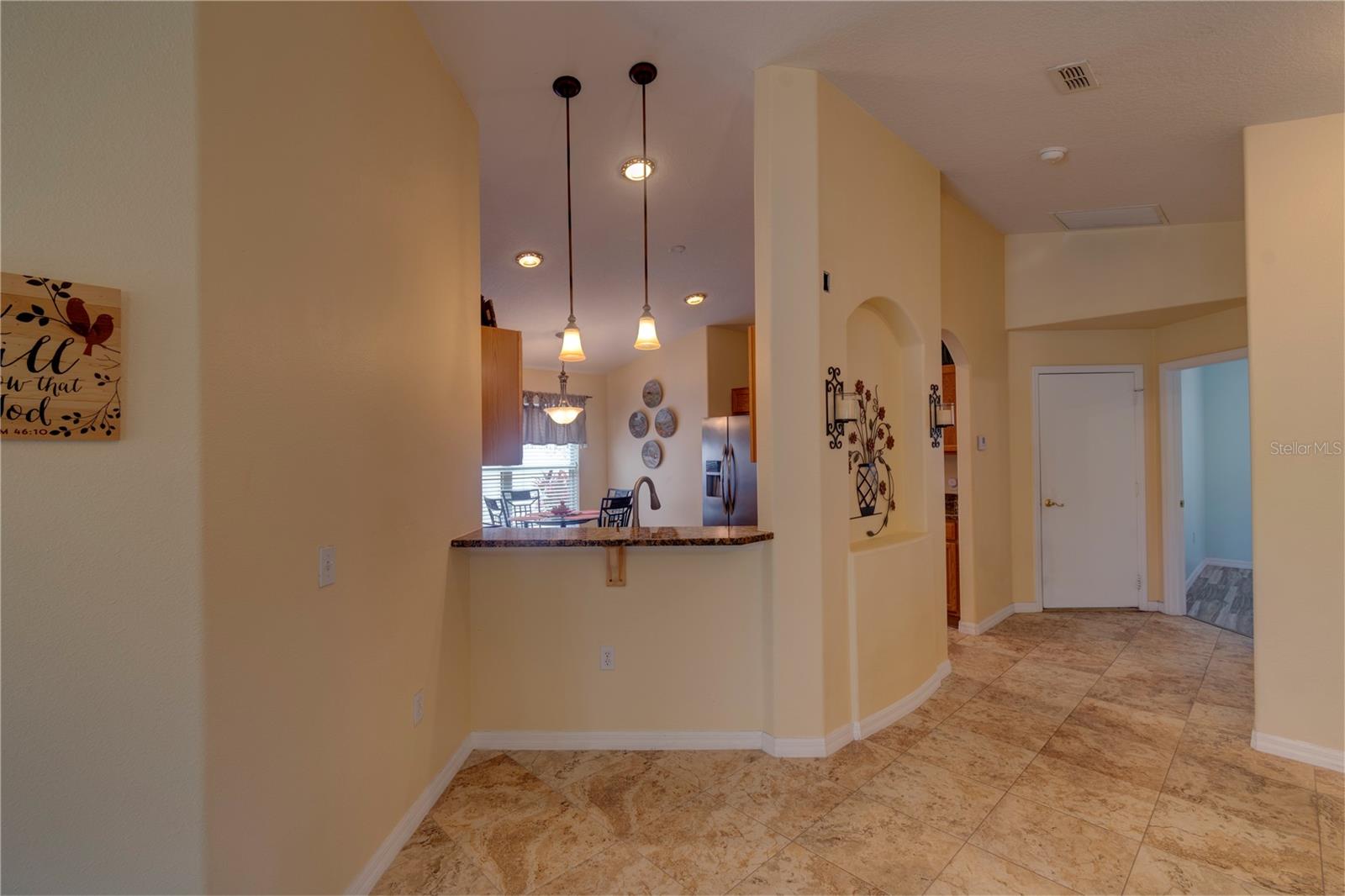 Pass-through from the kitchen to the dining area