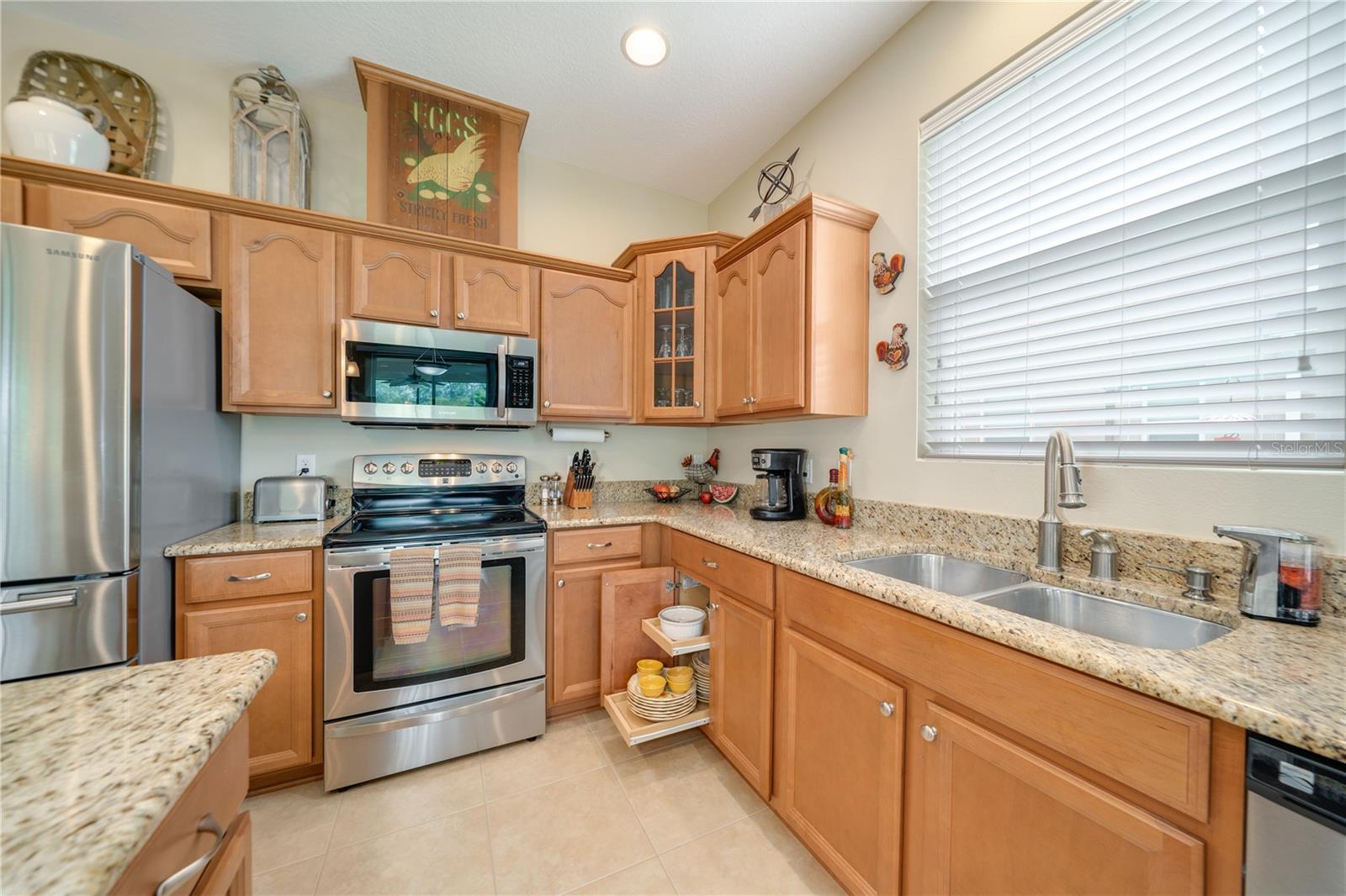 Stainless steel appliances and a useful island