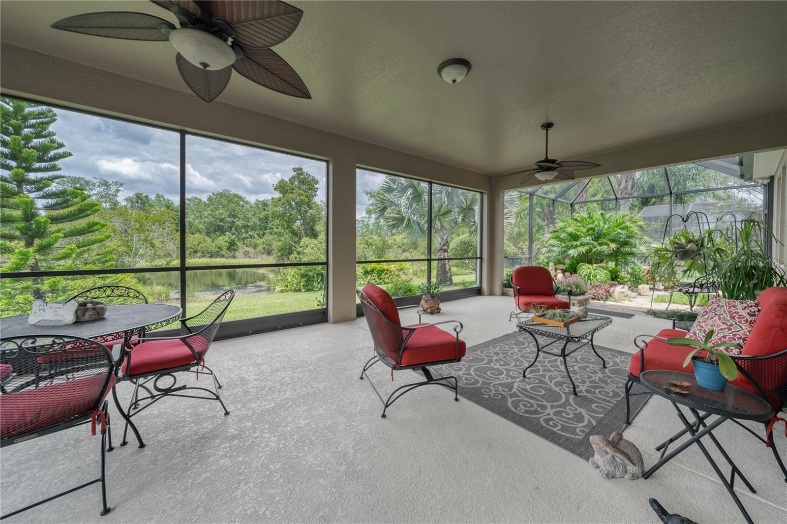 Large covered lanai that flows into the tropical atrium