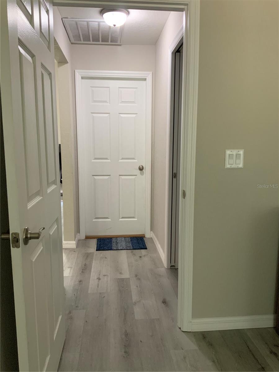 Hallway from master bedroom to laundry and garage