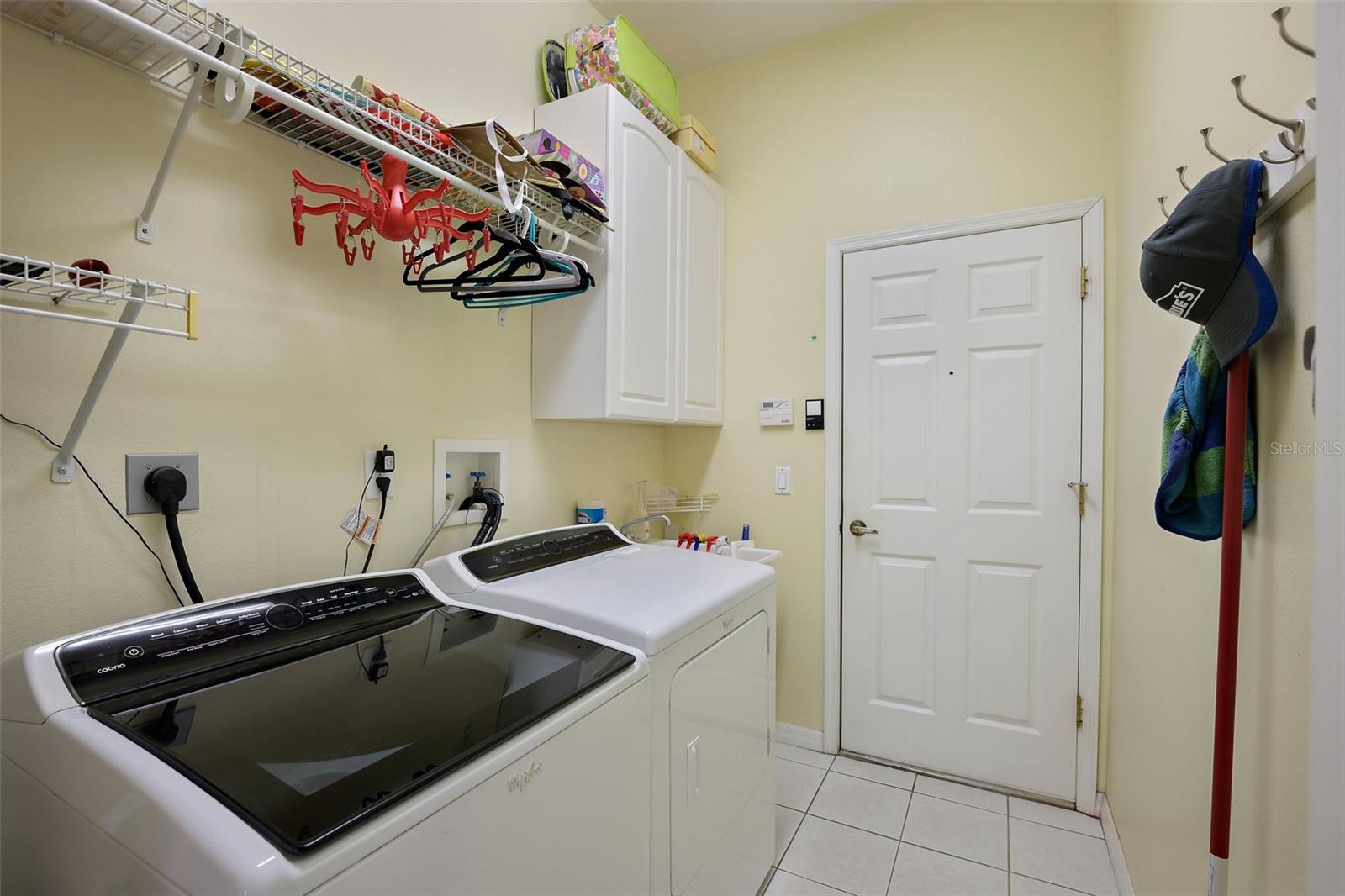 Indoor Laundry Room with Washer and Dryer included