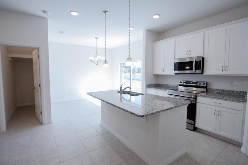 Interior photos are of different property, same floor plan.  This home has similar finishings.