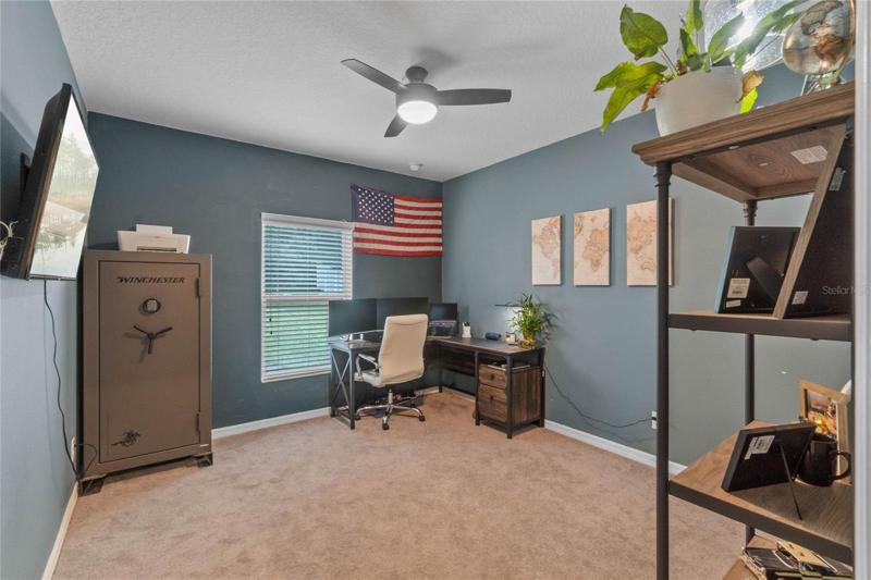 Main floor bedroom with closet (Office)