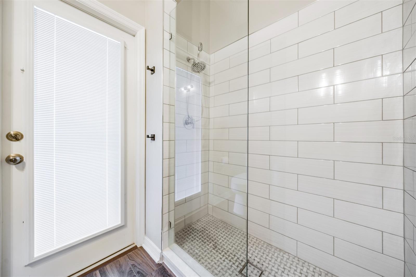 Updated shower in downstairs full bath