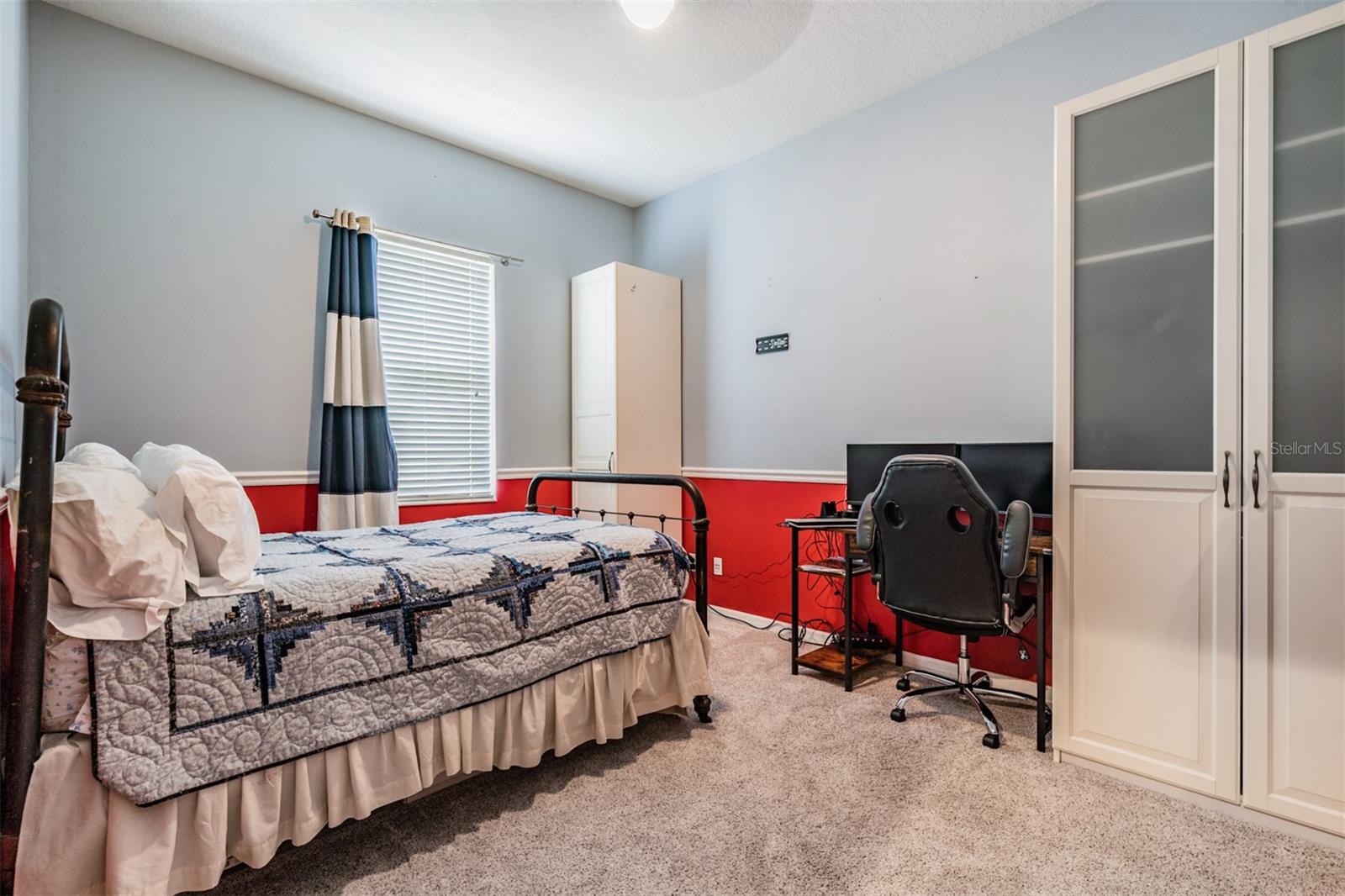 5th Bedroom downstairs. Armoire stays