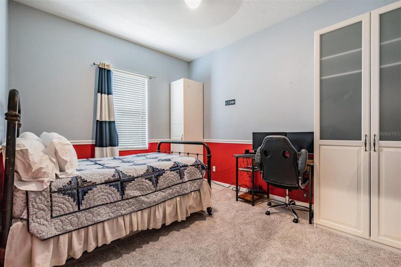 5th Bedroom downstairs. Armoire stays