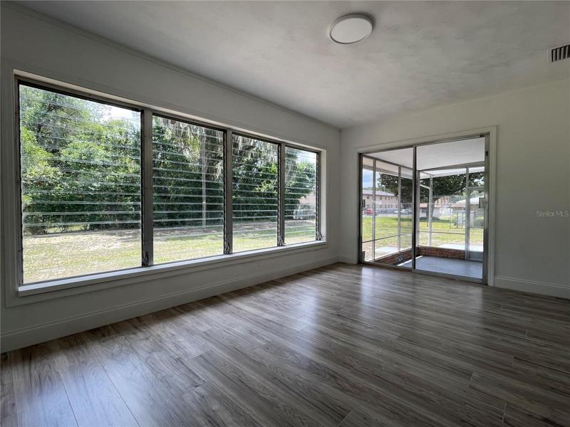 FL Room leading into a Screened-In Lanai