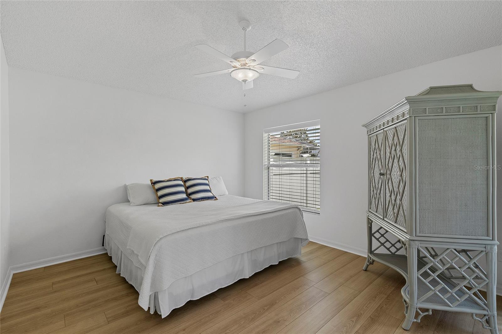 MASTER BEDROOM WITH BEAUTIFUL FLOORING